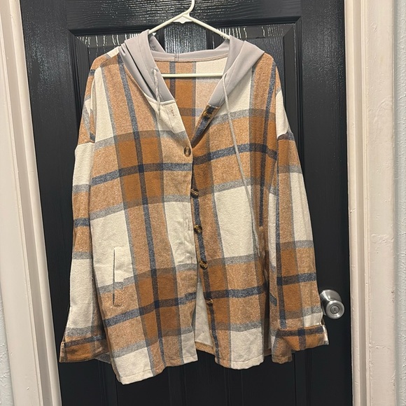 gabes Tops - The flannel and the tan shirt are 2X in the black-and-white stripe is 3X